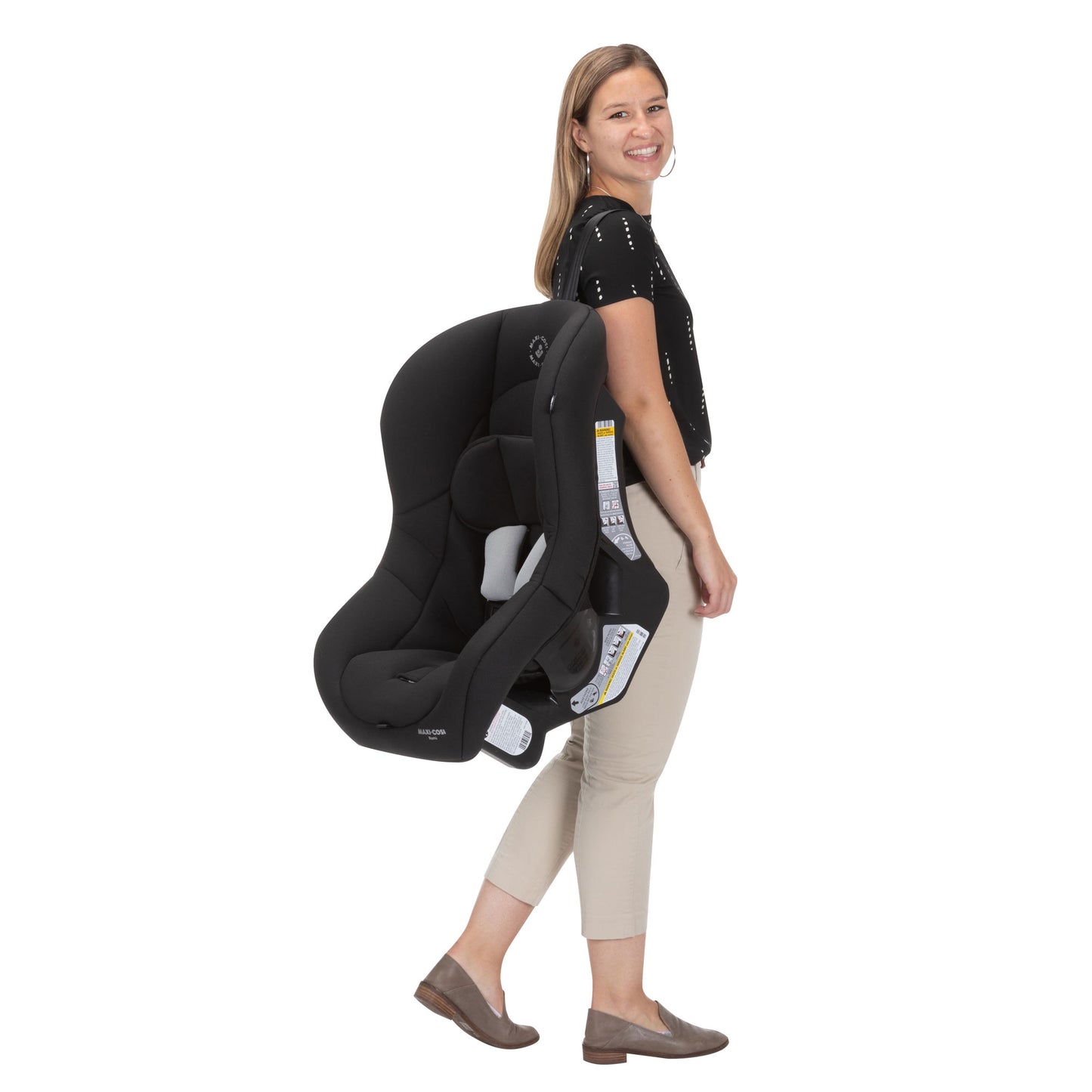 Woman carrying Maxi-Cosi Romi Convertible Car Seat - Essential Black