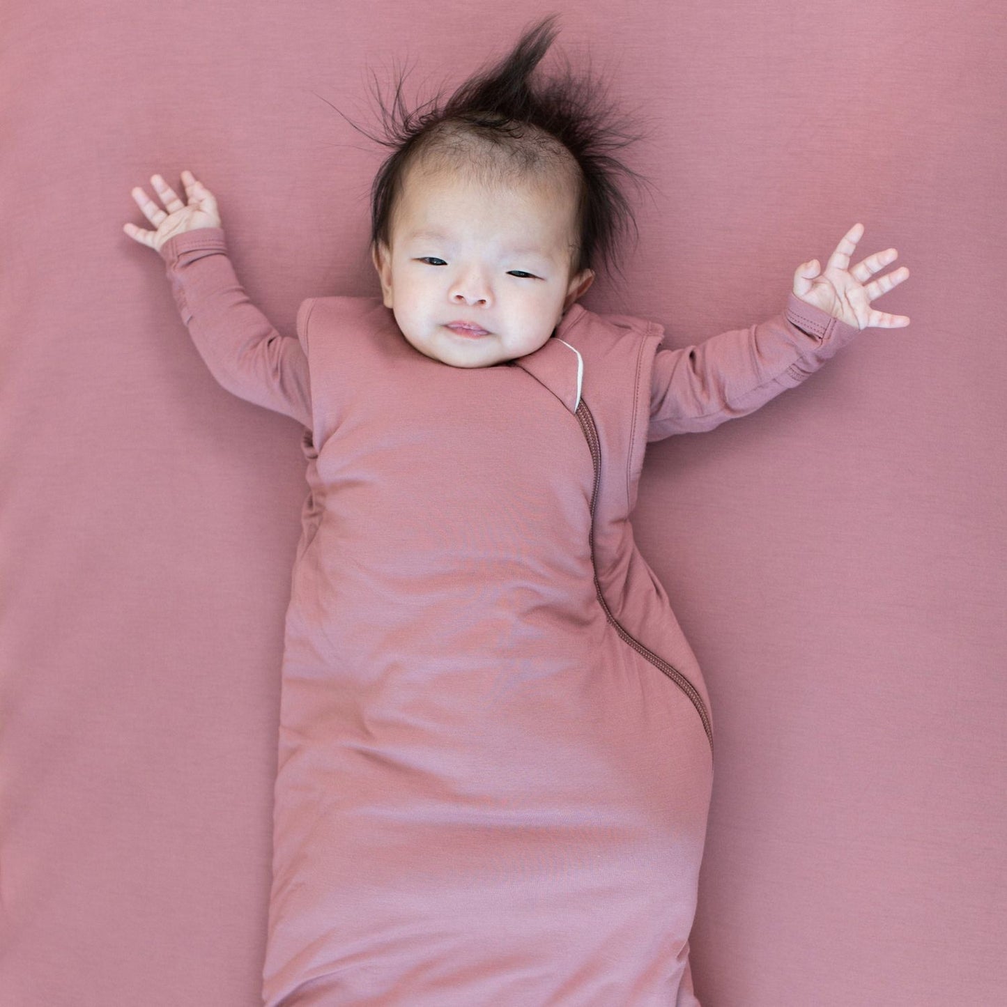Baby wears Kyte Baby Sleep Bag - Dusty Rose - 2.5 Tog