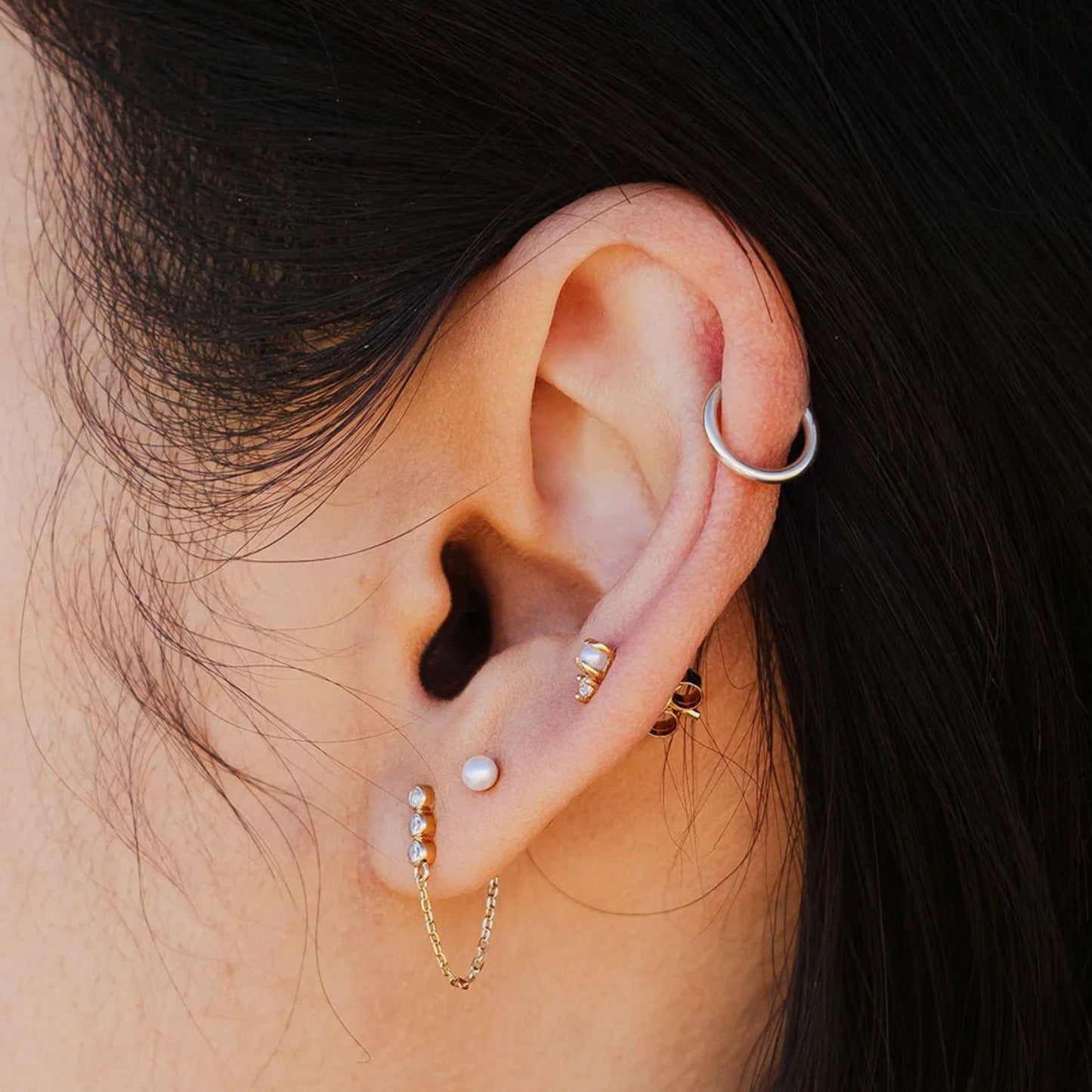 Woman wearing Made by Mary Silver Hoop Earrings - Mini