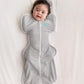Baby wearing Love to Dream Swaddle Up Original Swaddler - Gray