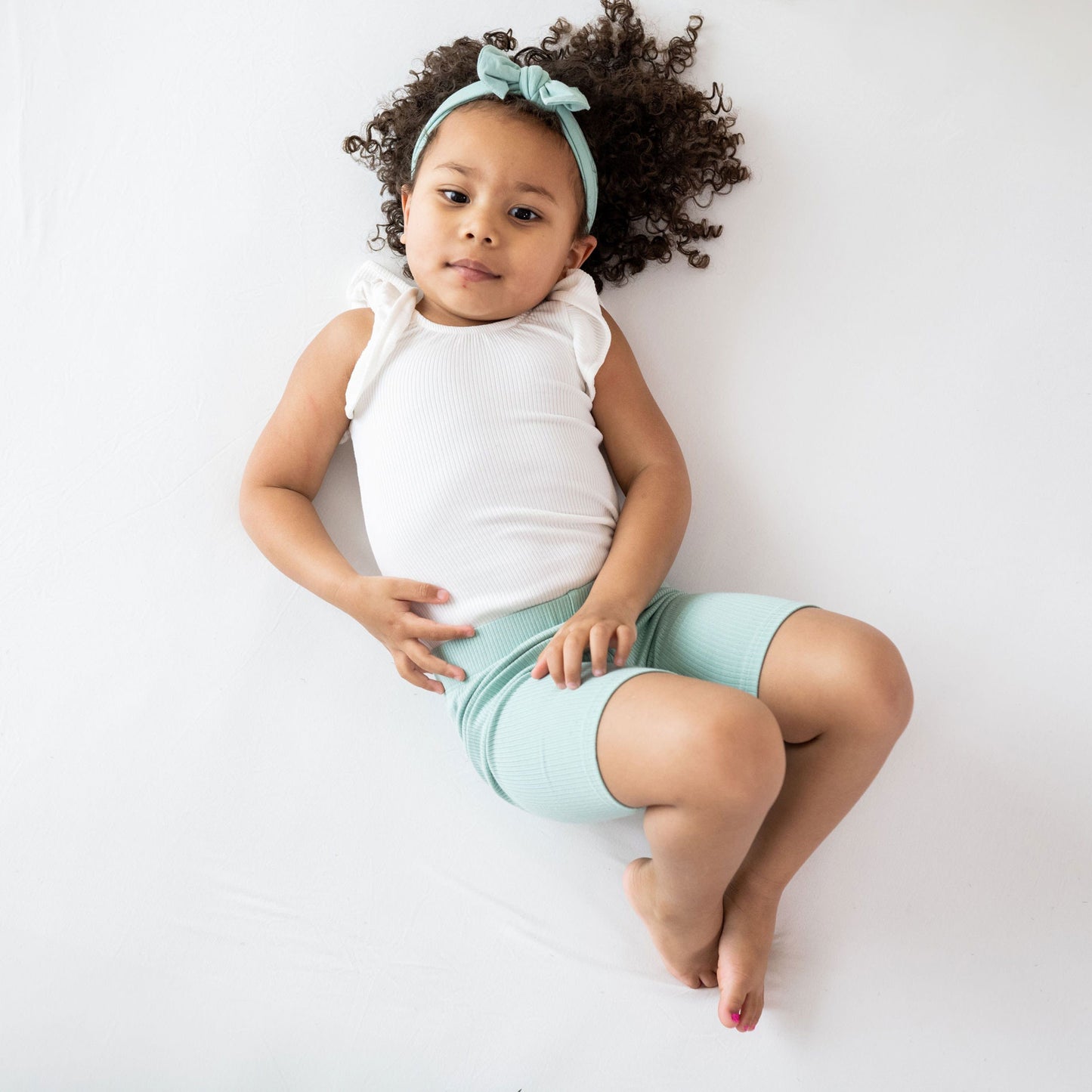 Kyte BABY Ribbed Sleeveless Ruffle Leotard - Cloud