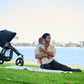 Mother with Baby next to Bumbleride 2022 Indie Stroller - Black