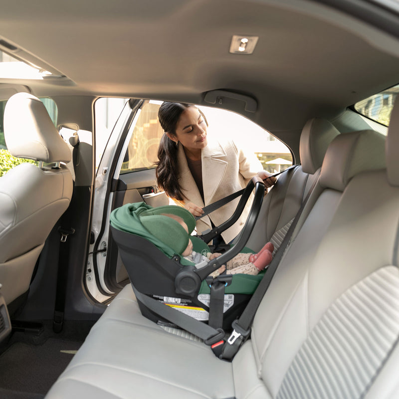 Mom installs UPPAbaby ARIA Infant Car Seat - GWEN (Green) with seat belt