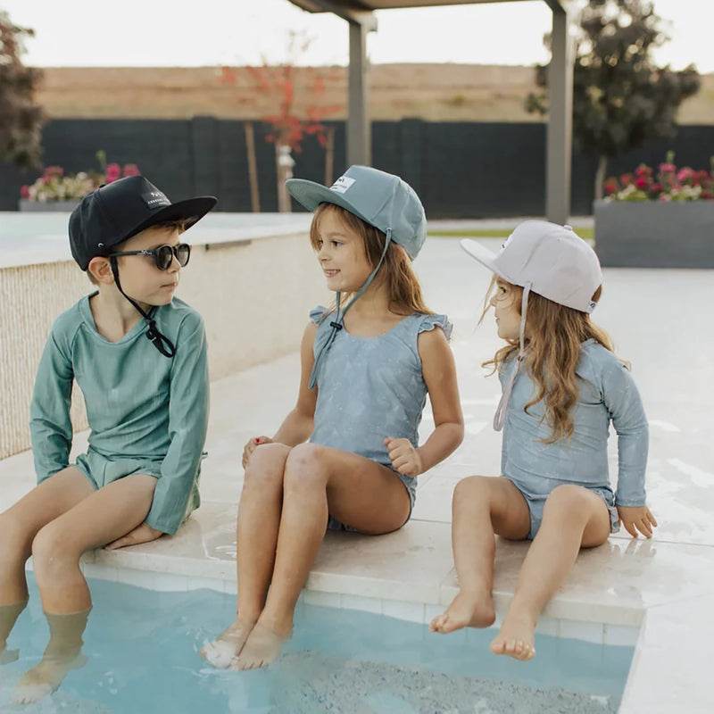 Kids by pool wearing Current Tyed Clothing Made for "Shae'd" Waterproof Snapback - Beige