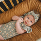 baby wearing Mebie Baby Ruffle Sleeve Bamboo Bodysuit - Light Green Daisy