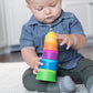 Toddler playing with Fat Brain Toys Dimpl Stack