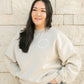 Woman wearing The Baby Cubby Crewneck Sweatshirt - You're Doing A Great Job Mama - Sand