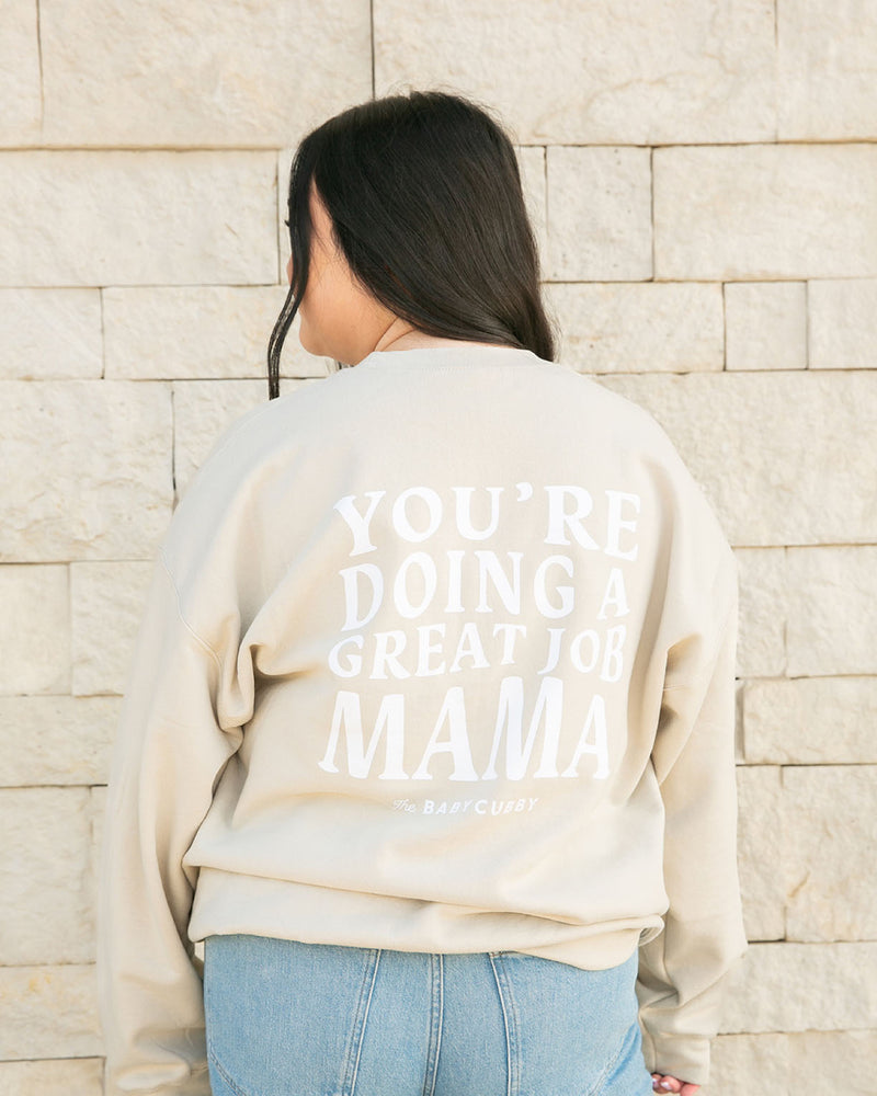 Woman wearing The Baby Cubby Crewneck Sweatshirt - You're Doing A Great Job Mama - Sand