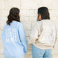 Women wearing The Baby Cubby Crewneck Sweatshirt - You're Doing A Great Job Mama - Sand