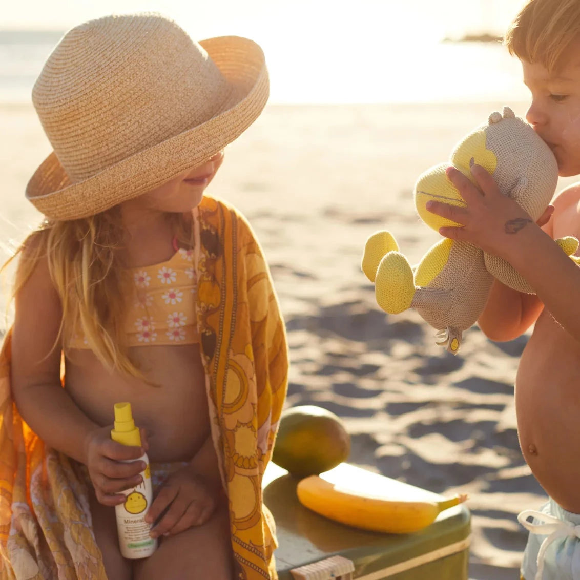 Kids at the beach using Sun Bum Baby Bum SPF 50 Mineral Sunscreen Spray - Fragrance Free