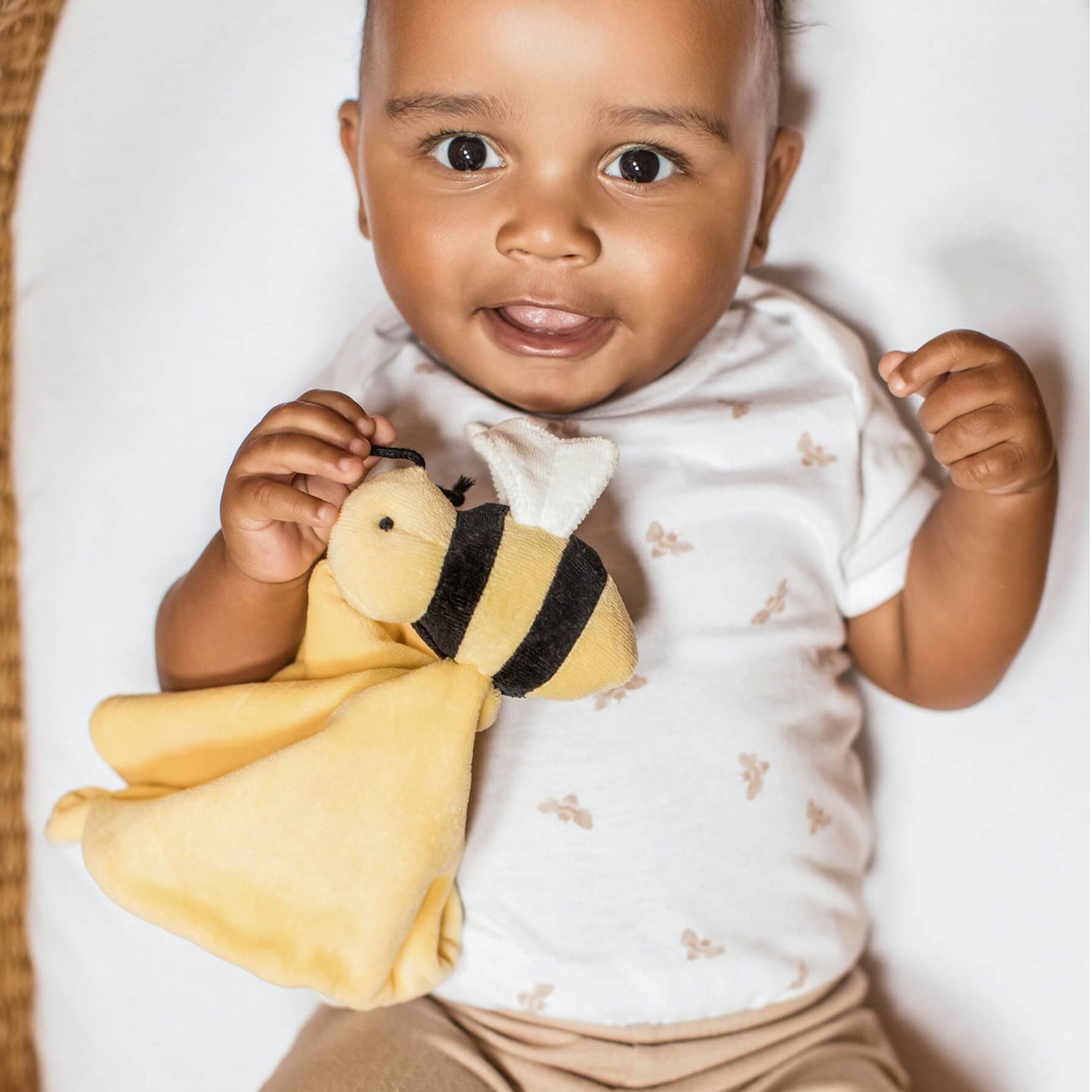 Baby wearing Burt's Bees Bodysuit and Ribbed Pant Set - Golden Bee - Cloud