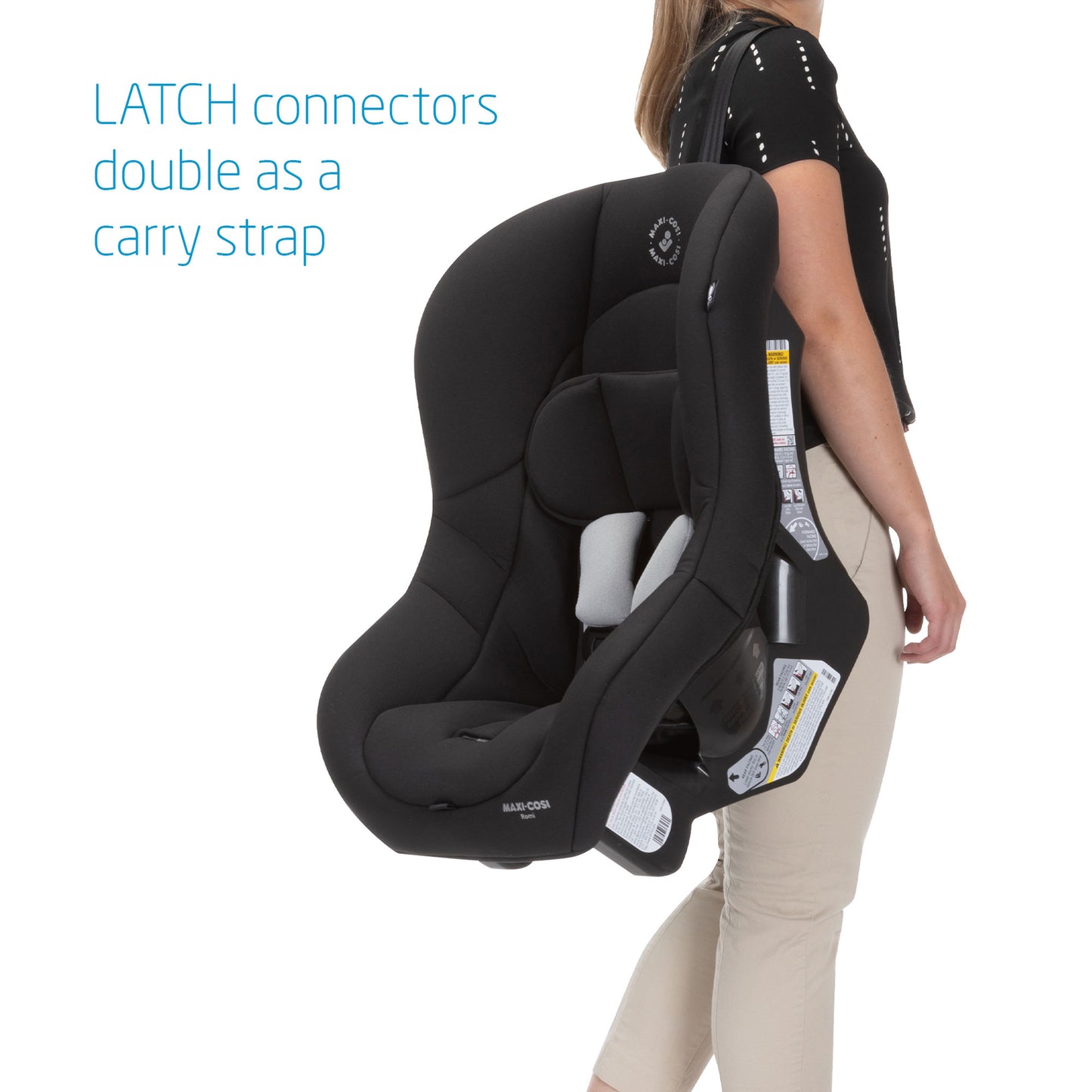Woman carrying Maxi-Cosi Romi Convertible Car Seat - Essential Black