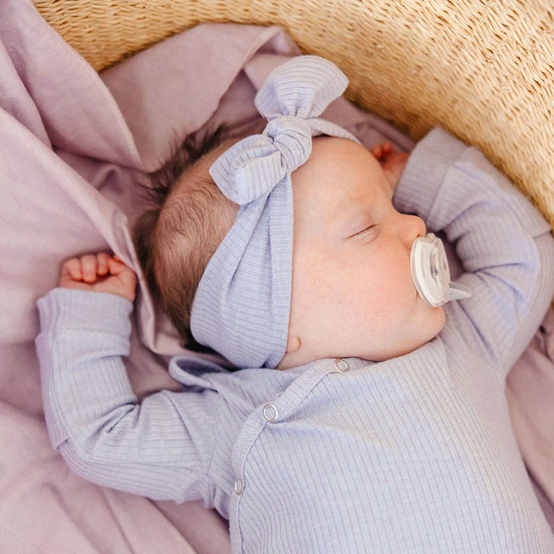 Baby wearing Copper Pearl Rib Knit Headband Bow - Periwinkle