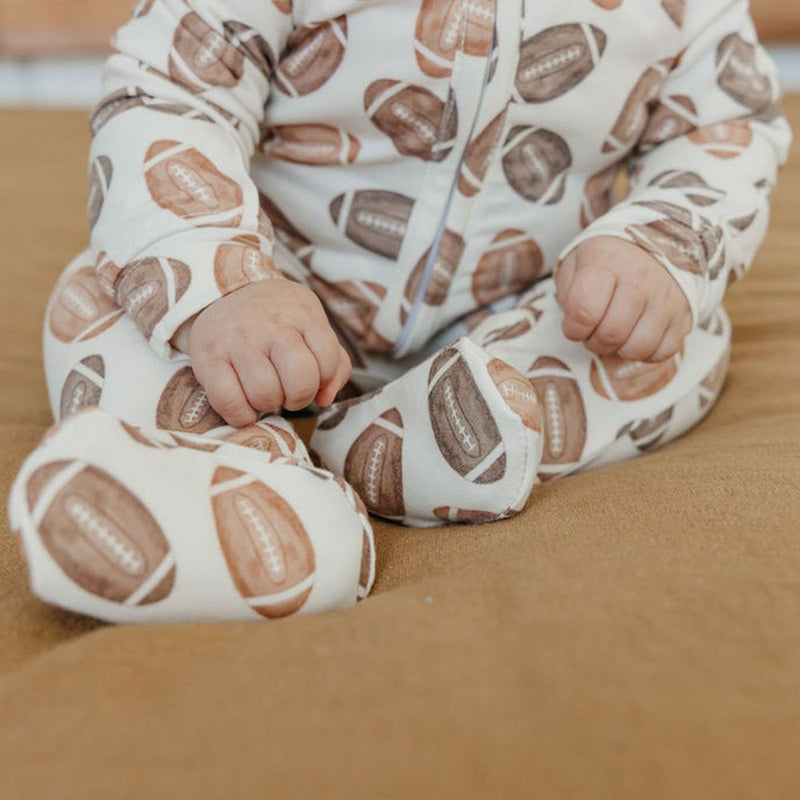 Baby wearing Copper Pearl Zip-up Footie - Blitz