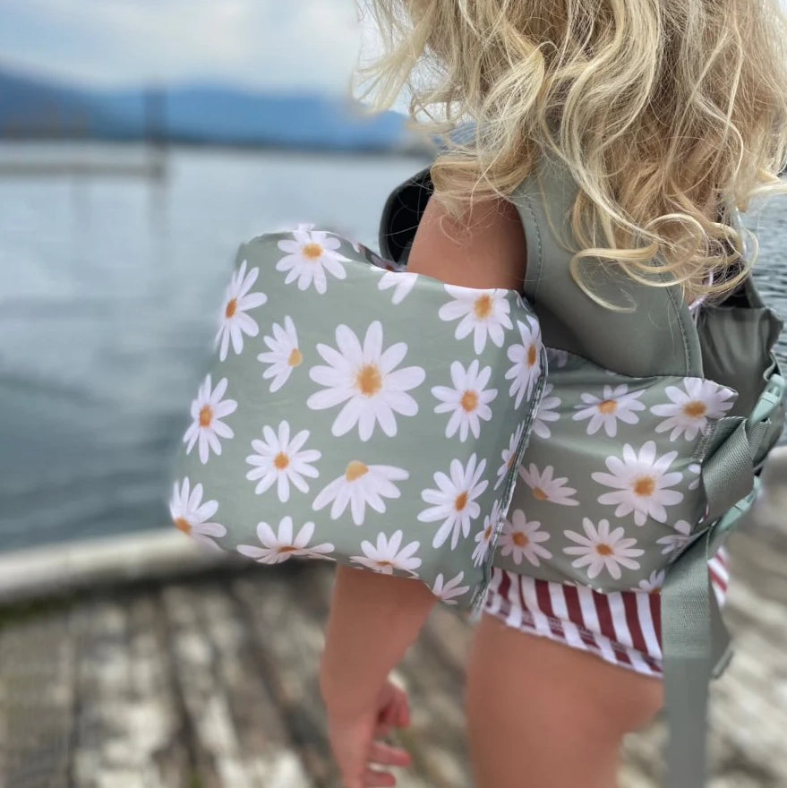 Girl at a lake wearing Current Tyed Clothing Swim Floaties - Sage Daisies