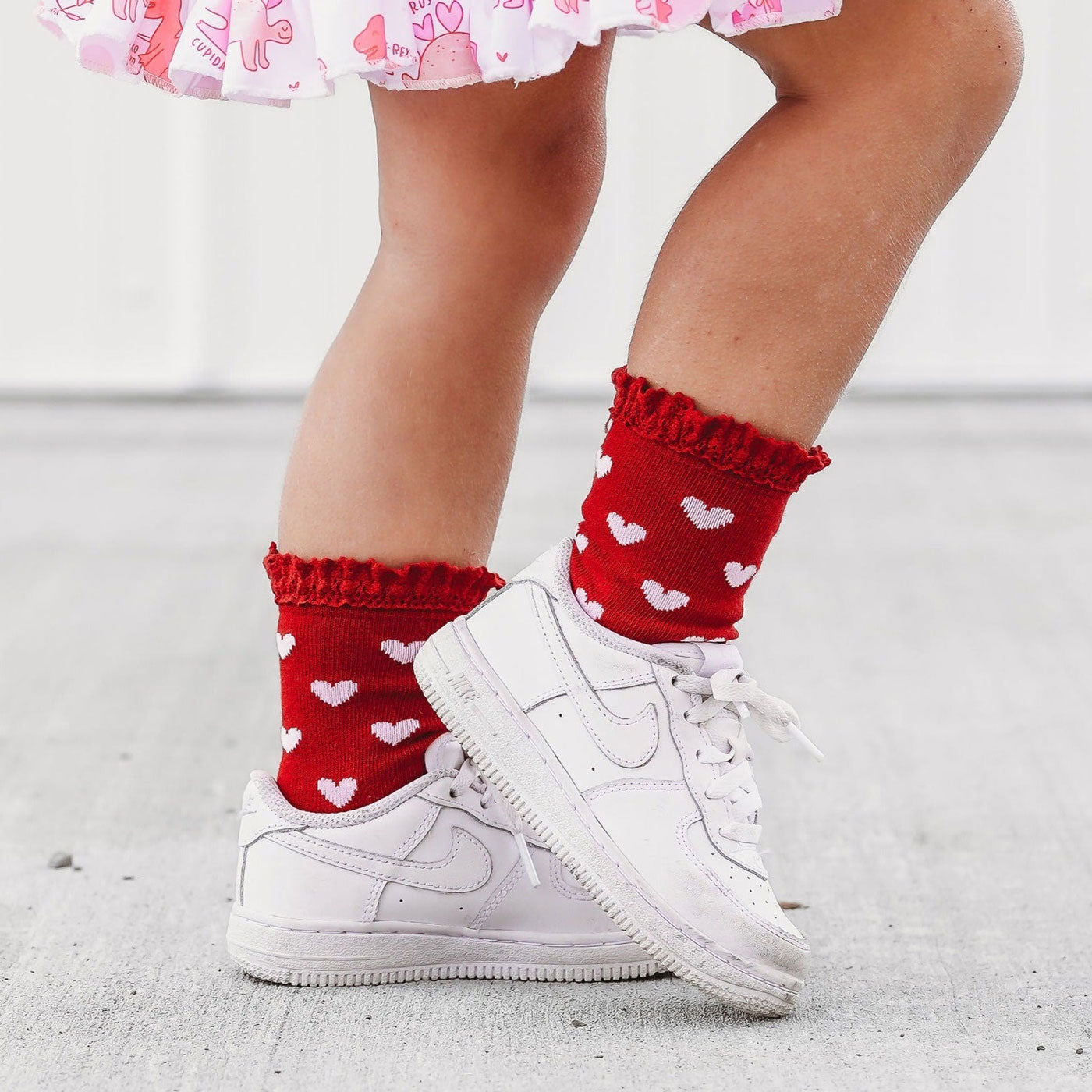 Little girl wearing Little Stocking Co Lace Midi Sock 3-Pack - Valentine's