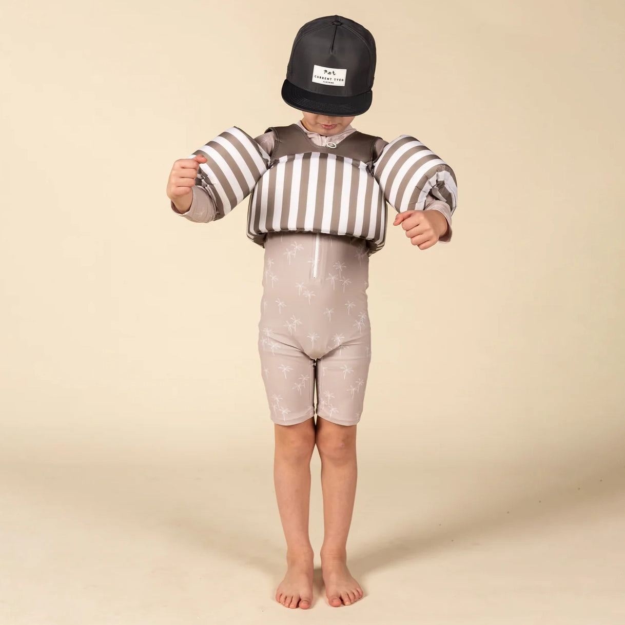 Boy wearing Current Tyed Clothing Swim Floaties - Brown Stripes