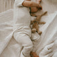 Baby wearing Jamie Kay Organic Essential Tee Bodysuit - Oatmeal Marle
