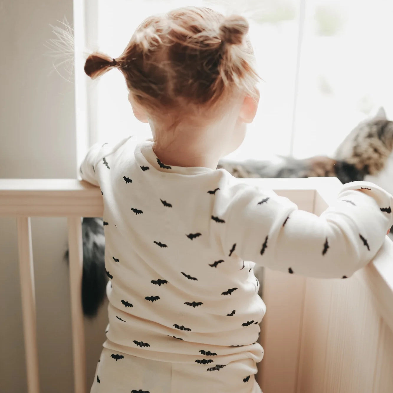 child wearing Lovedbaby Organic Kids' Long-Sleeve PJ Set - Bats 