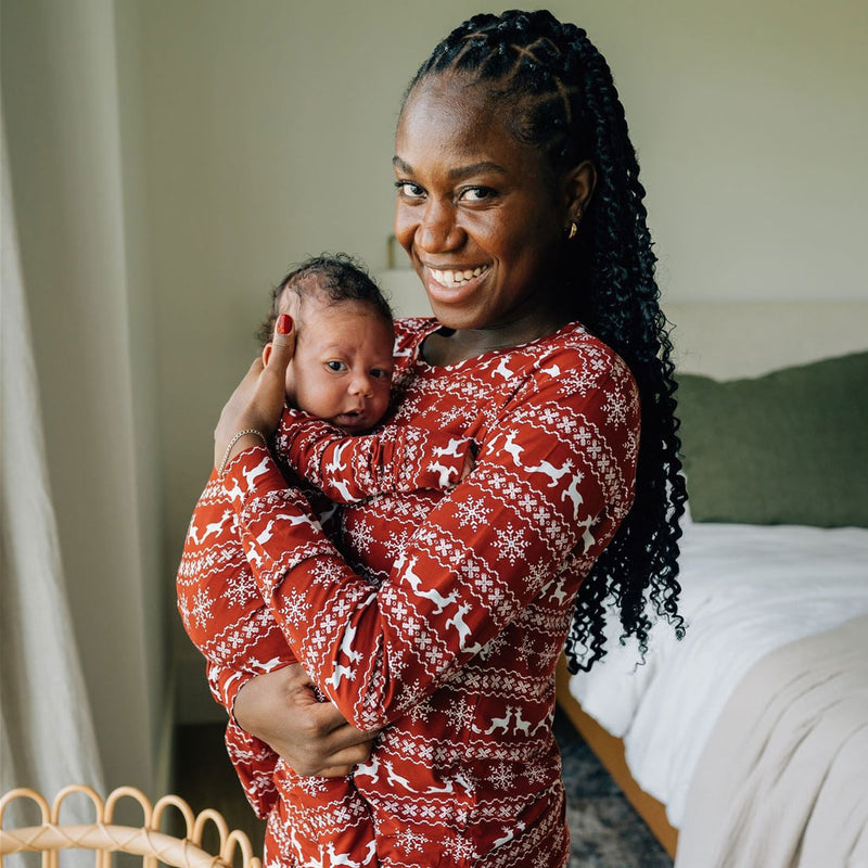 Mom holding baby wearing Mebie Baby Bamboo Zipper - Fair Isle