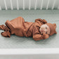 Baby lying on Mebie Baby Crib Sheet - Desert Sage