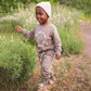 Little boy exploring woods while wearing Mebie Baby French Terry Set - Adventure