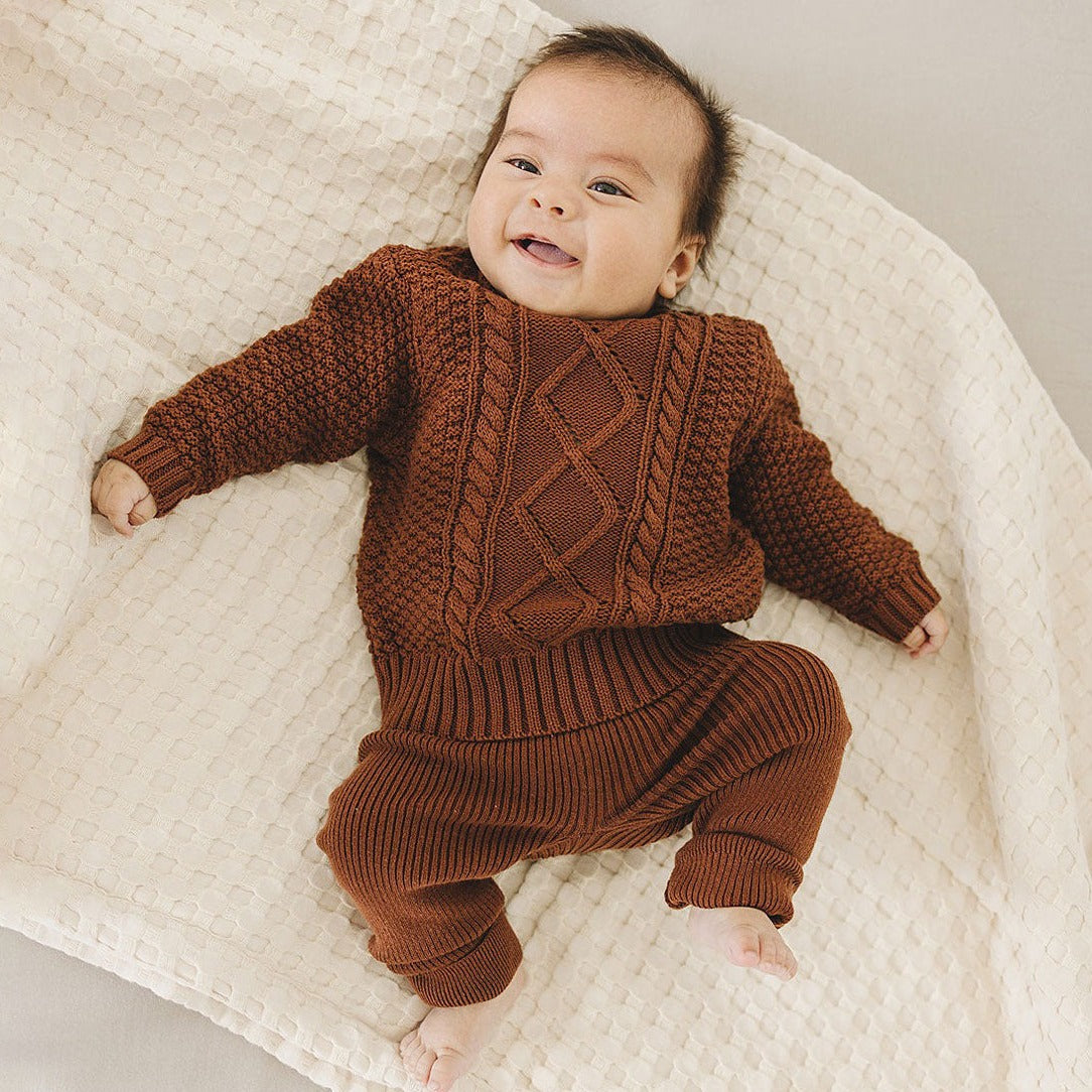 Baby wearing Mebie Baby Knit Leggings - Dark Rust