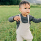 Toddler boy wearing Mebie Baby Knit Pocket Overalls - Heather Grey