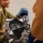 Couple walks with Bugaboo Dragonfly Complete Stroller with Seat and Bassinet
