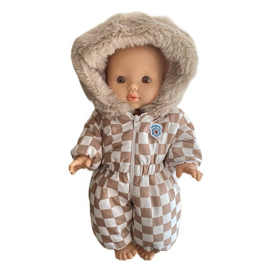Doll wearing Minikane Doll Clothing - Gigi Ski Suit - Beige / White Checkered and Flake Pin