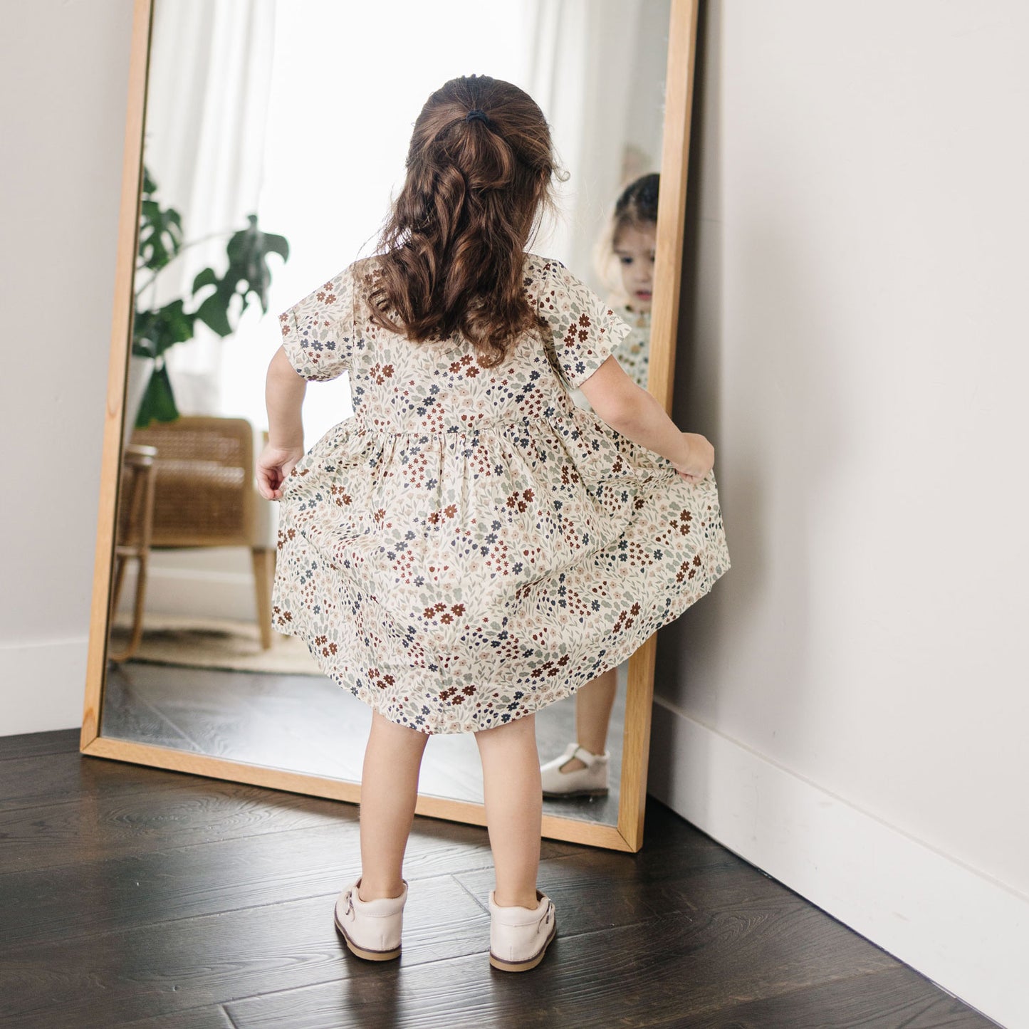 Girl wearing Mebie Baby Cotton Dress - Bloom