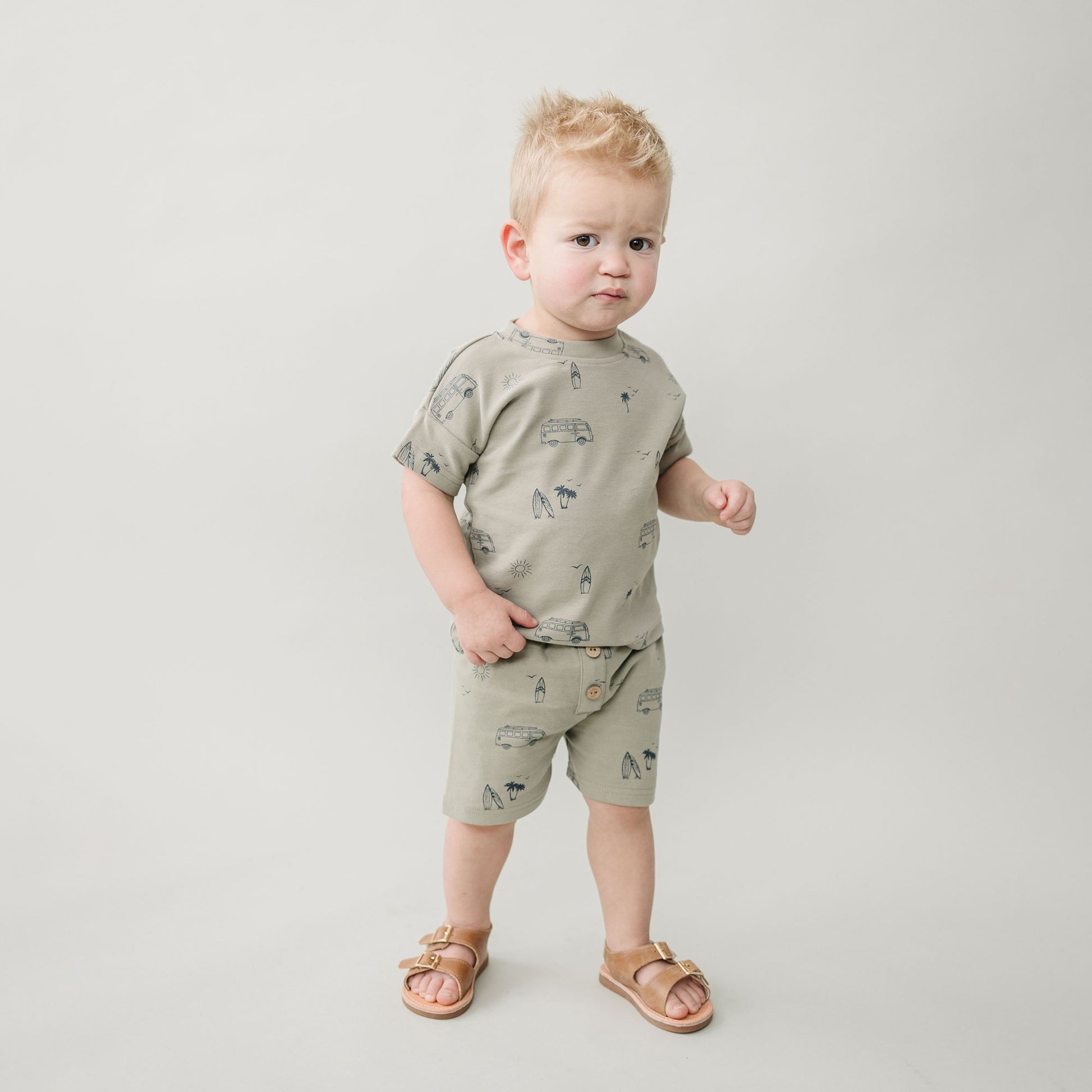 Little boy wearing Mebie Baby Button Short Set - Beach