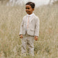 Boy standing in field wearing Noralee Skinny Tie - Vines - Berry / Natural