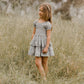 Girl wearing Noralee Cosette Dress - Provence