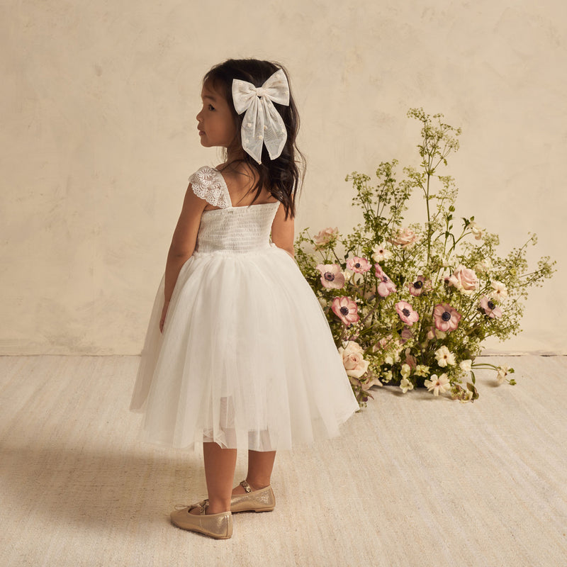 Little girl wearing Noralee Oversized Bow - Ivory Floral Tulle