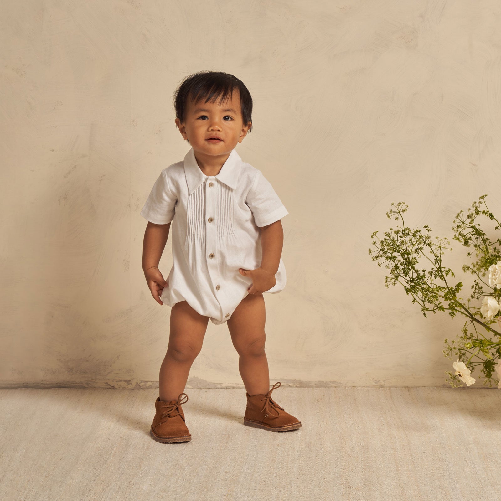 Toddler wearing Noralee Henry Romper - White
