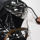 Parent using Nuna TRIV Series Rain Cover - Black and Clear