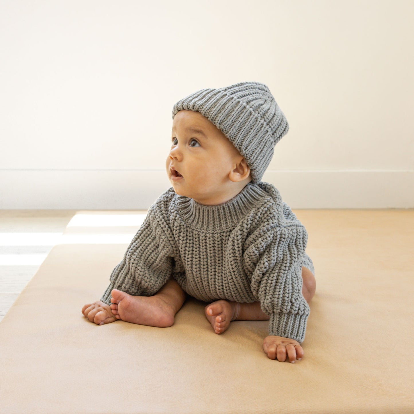 Baby wearing Quincy Mae Chunky Knit Sweater - Basil