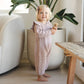 Toddler girl wearing Quincy Mae Long Sleeve Mira Knit Romper - Mauve Heathered