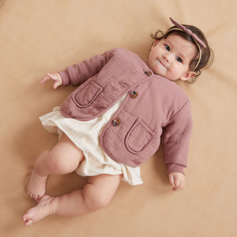 Baby girl wearing Quincy Mae Quilted V-Neck Button Jacket - Fig
