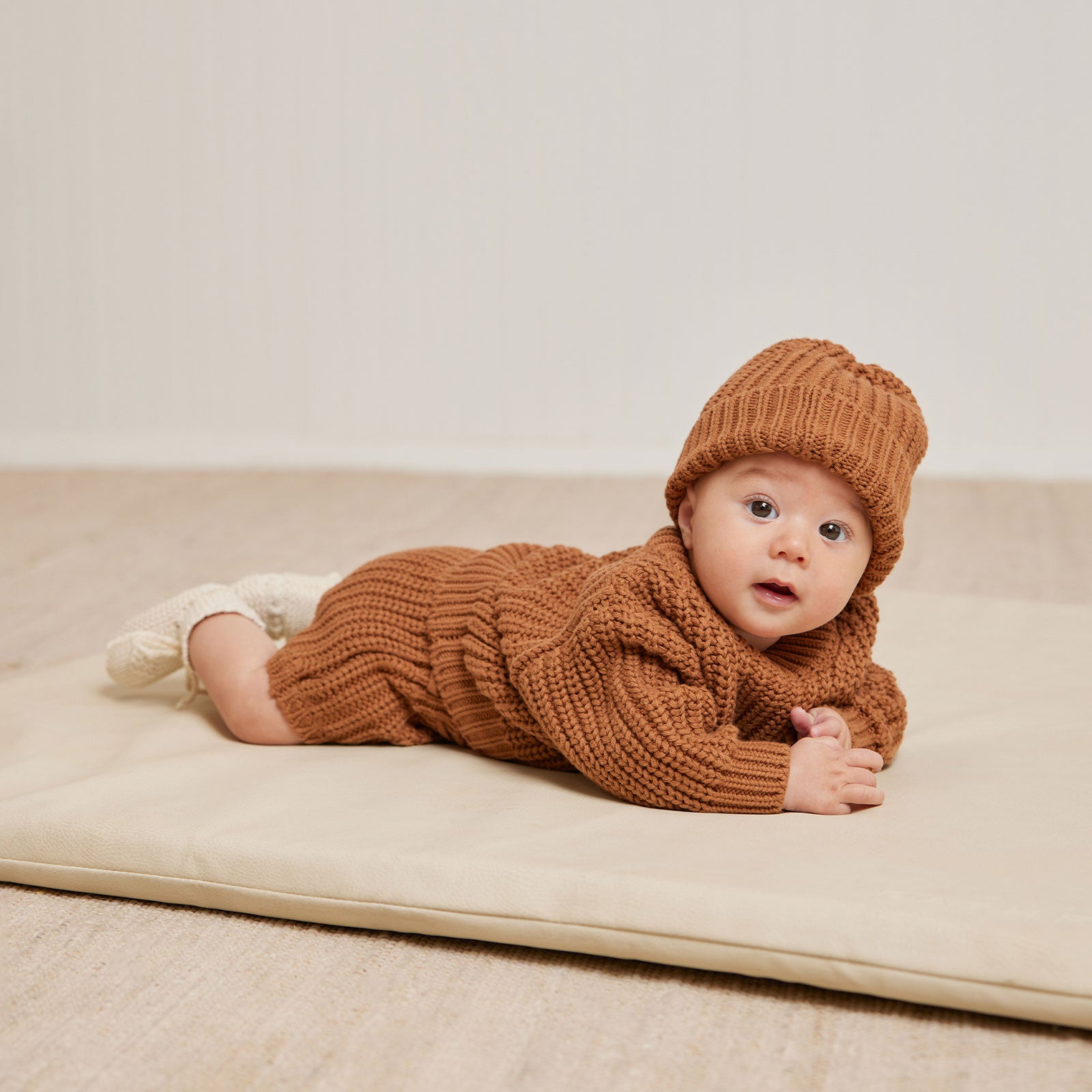 Baby wearing Quincy Mae Chunky Knit Sweater - Cinnamon