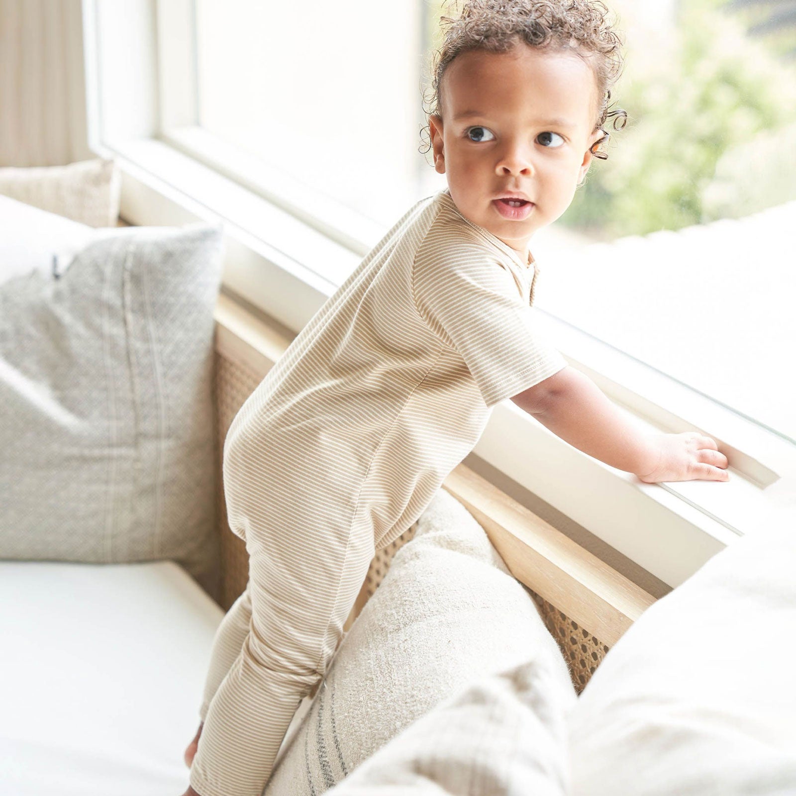 Toddler wearing Quincy Mae Short Sleeve Jumpsuit - Latte Micro Stripe