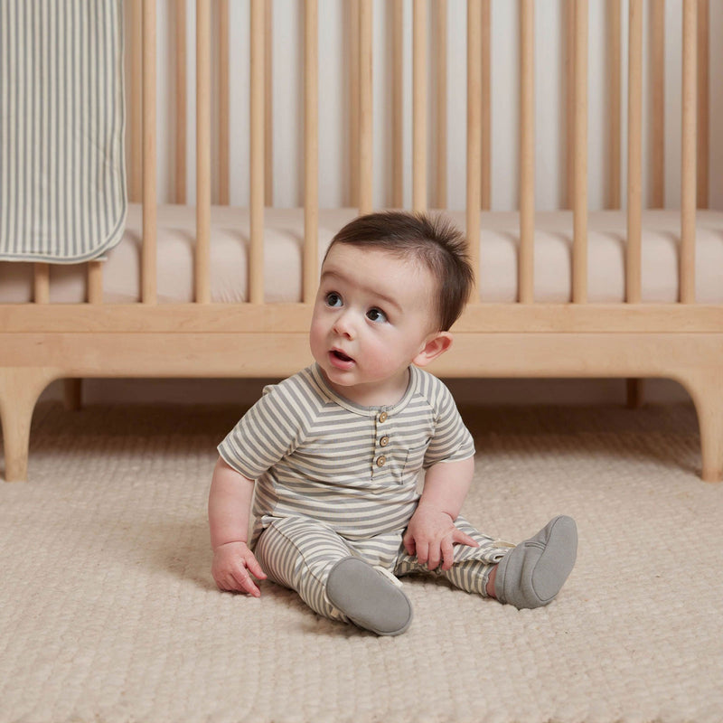 Baby wearing Quincy Mae Short Sleeve Jumpsuit - Dusty Blue Stripe