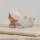 Baby wearing Quincy Mae Knotted Baby Hat - Ivory