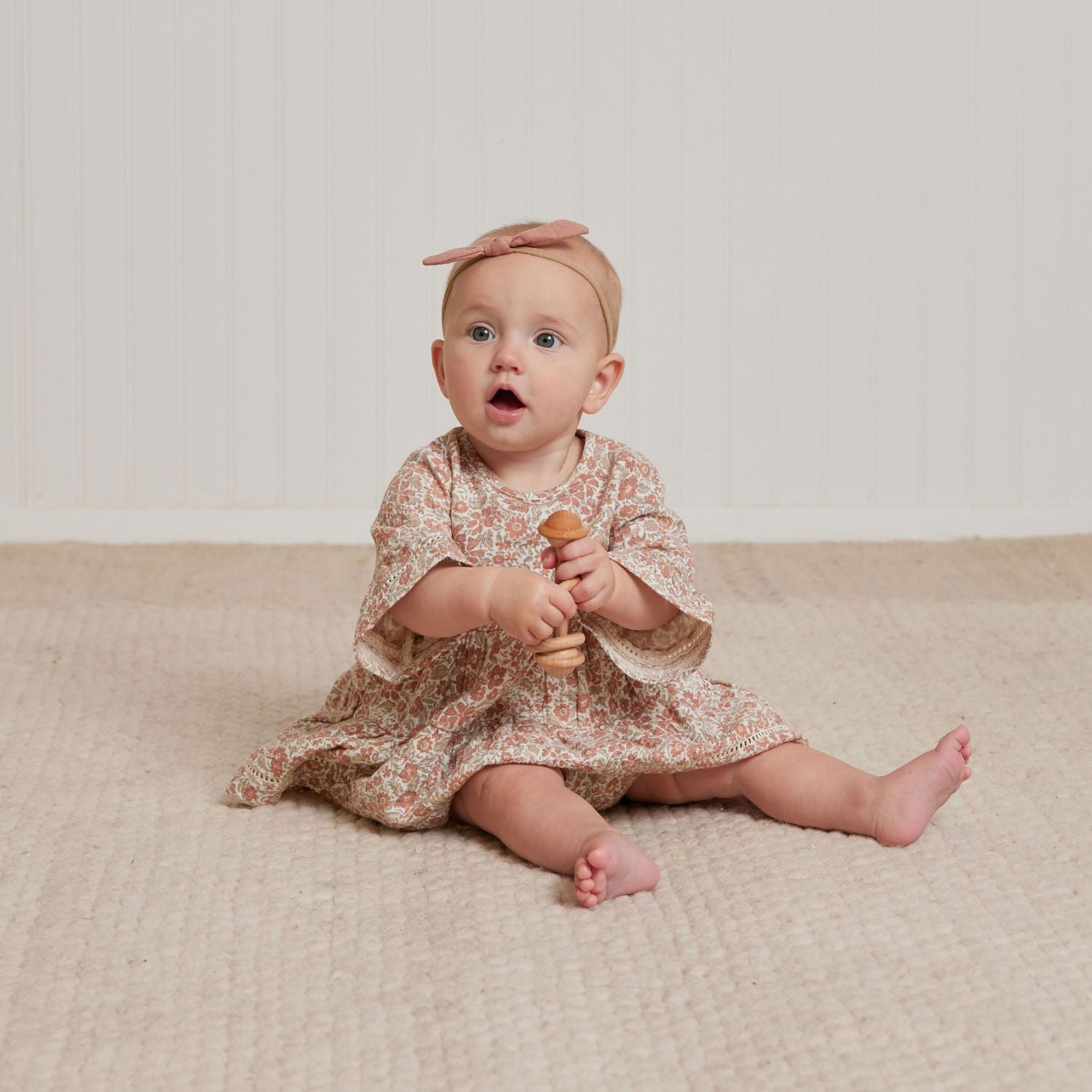 Baby girl wearing Quincy Mae Belle Dress - Rose Garden