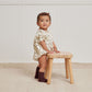 Toddler girl wearing Quincy Mae Cosette Romper - Navy Dot - Ivory