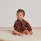 Toddler wearing Quincy Mae Henley Bubble Romper - Plum