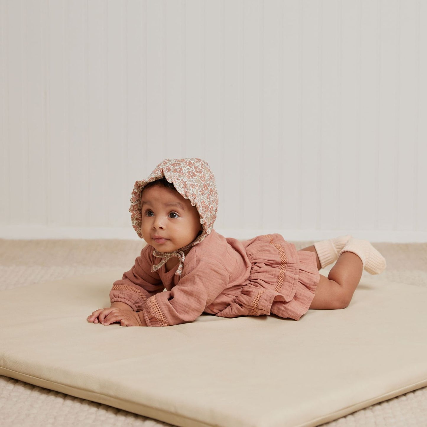 Baby girl wearing Quincy Mae Rosie Romper - Rose