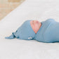 Newborn baby wearing Quinn St Top Knot Hat - Sky