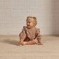 Toddler girl wearing Rylee and Cru Winnie Romper - Brown Gingham